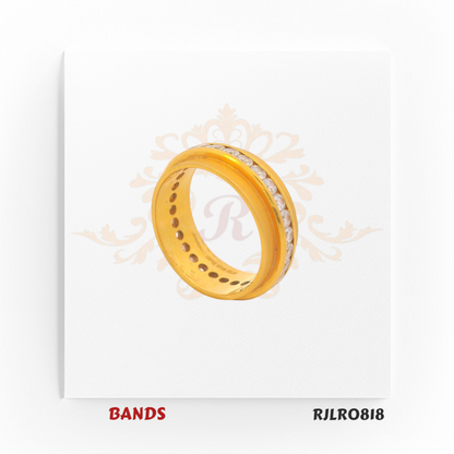 Bold and sophisticated gold ring in radiant yellow gold, featuring sparkling white stones set around the center for timeless glamour. RJLR0818.