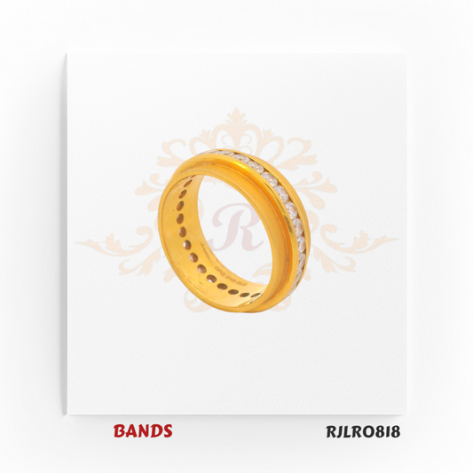 Bold and sophisticated gold ring in radiant yellow gold, featuring sparkling white stones set around the center for timeless glamour. RJLR0818.