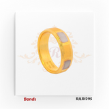 This striking 22kt gold band showcases a polished yellow gold foundation accented with rectangular white gold panels arranged in an alternating pattern, creating a sophisticated two-tone effect. Style Code: RJLR1295.