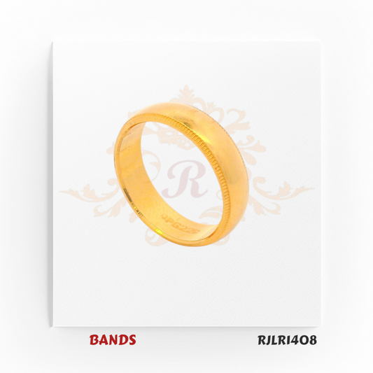 Minimalist gold ring crafted in polished yellow gold, featuring a smooth dome shape and refined etched edge for timeless style. RJLR1408.