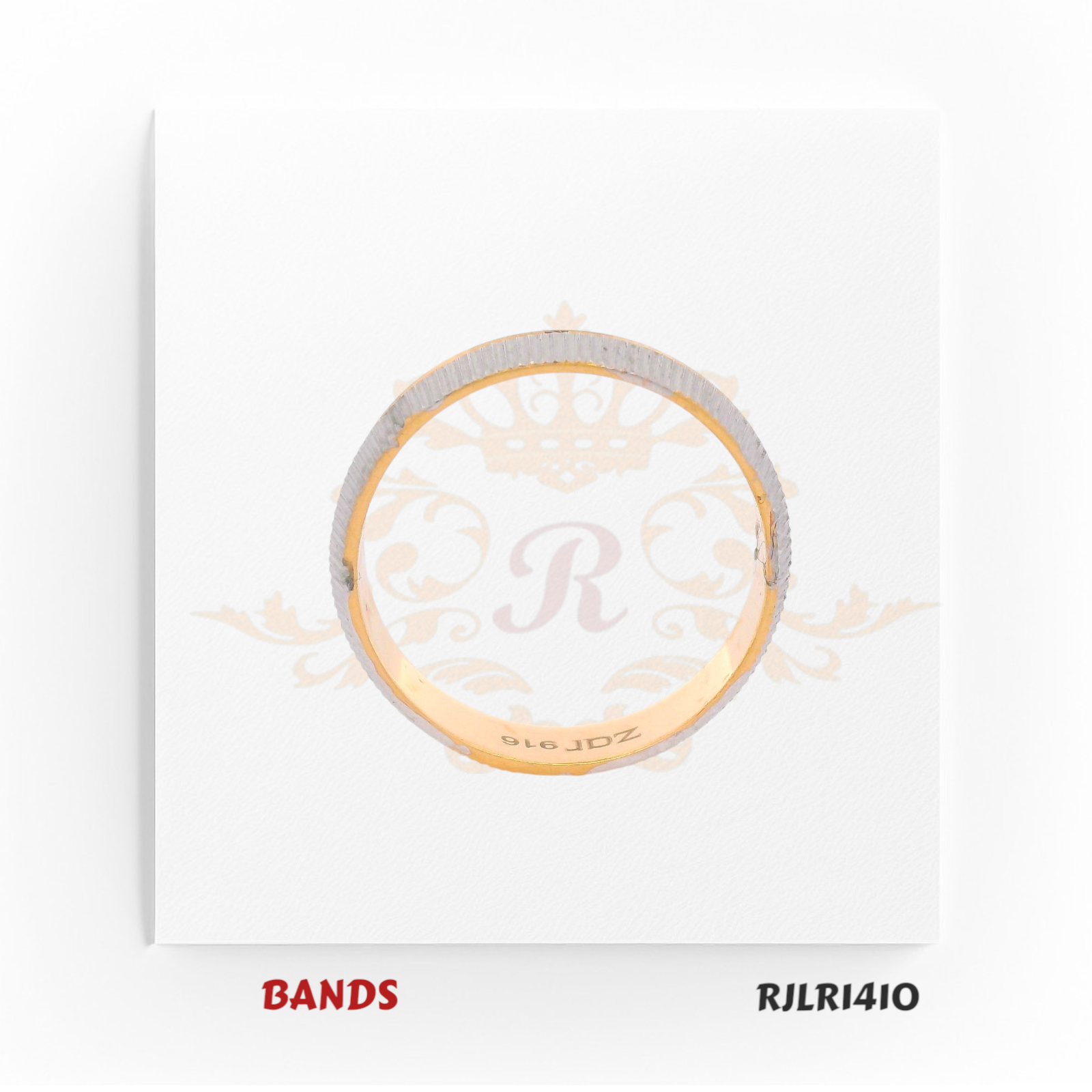 Slim 22kt two-tone gold band with a brushed white gold exterior and polished yellow gold interior. Sleek and modern. Model number RJLR1410.