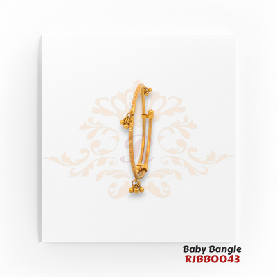 22kt Gold Baby Bangle RJBBO043 – A 6.10-gram, adjustable free-size baby bangle with traditional detailing and ghungroo accents, available at Regal Jewels.