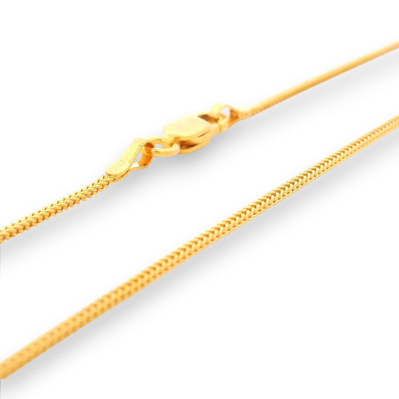 Delicate 22K gold baby chain with fine snake-link pattern, polished to a radiant shine. Lightweight and safe for newborns and toddlers, this Regal Jewels Chicago gold chain combines luxury and comfort — perfect for daily wear, birthdays, and baby gifts.