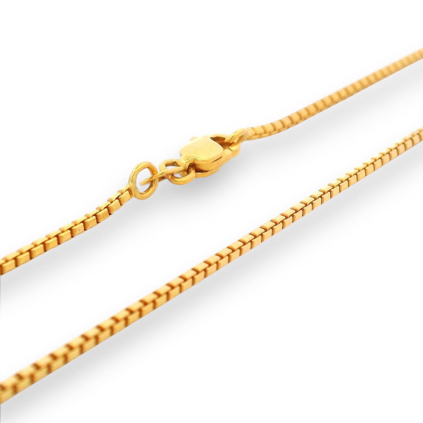 Elegant close-up of 22K gold baby chain (RJC30868a) with fine box-link detailing and a secure lobster clasp. From Regal Jewels Chicago, this gold chain combines sophistication, safety, and premium craftsmanship for babies.