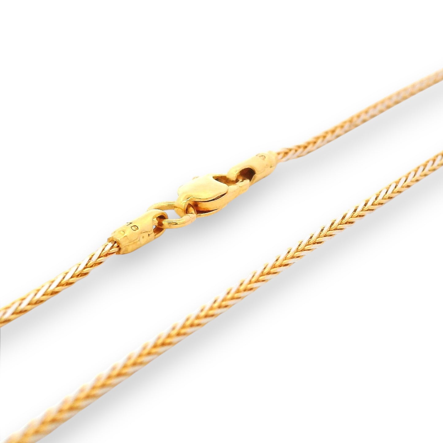 Close-up of 22K gold baby chain (RJC30871a) highlighting the intricate wheat-link texture and secure clasp. A Regal Jewels Chicago design crafted for elegance, comfort, and timeless gifting.