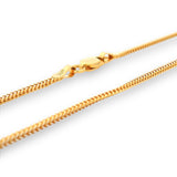 Close-up of 22K gold baby chain (RJC30880A) showcasing detailed curb-link texture and secure clasp design. A handcrafted piece by Regal Jewels Chicago — elegant, lightweight, and safe for everyday baby wear.