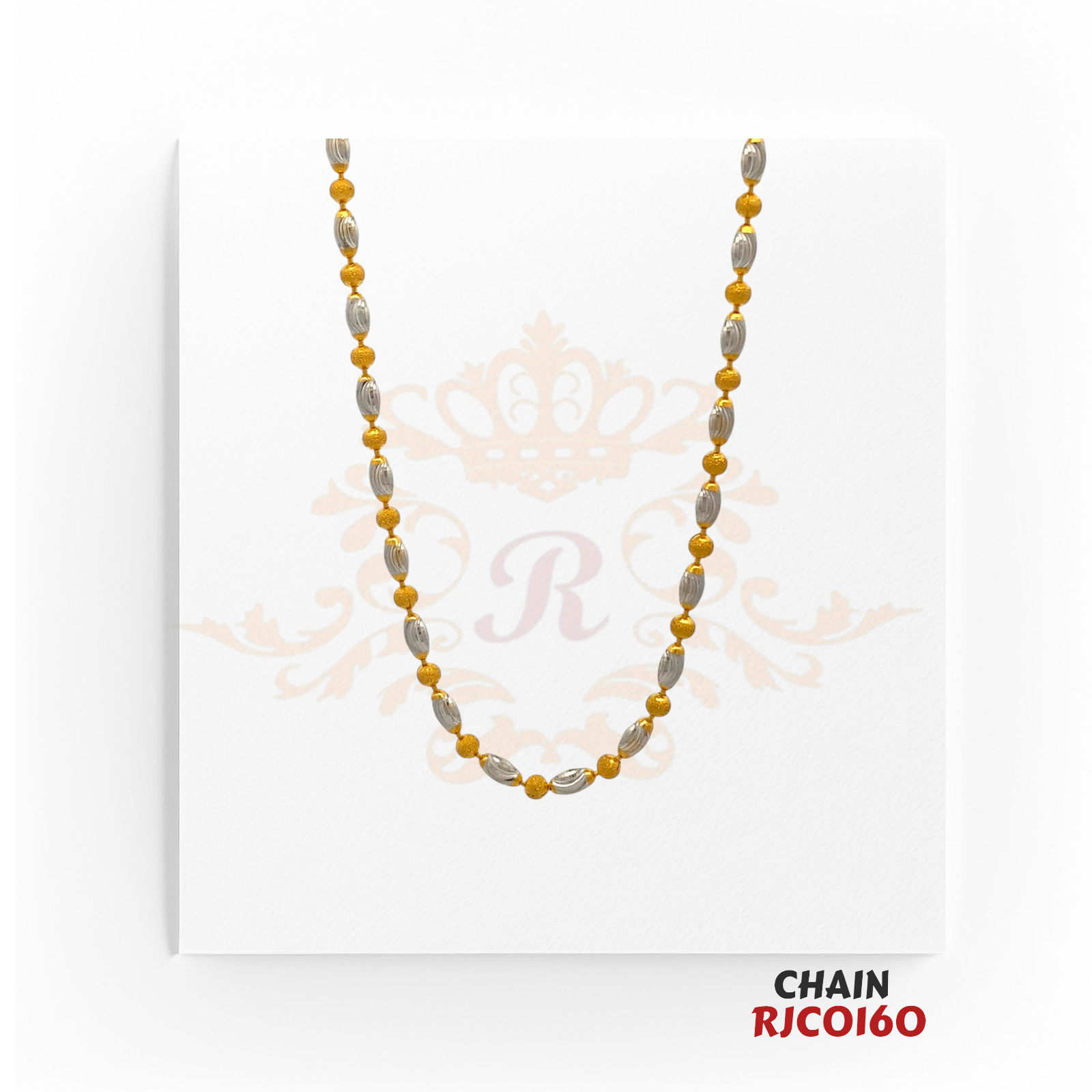 22kt Two-Tone Gold Oval Bead Chain RJCO160 – A 7.50-gram, 16-inch yellow gold and rhodium-finished chain. Available at Regal Jewels.