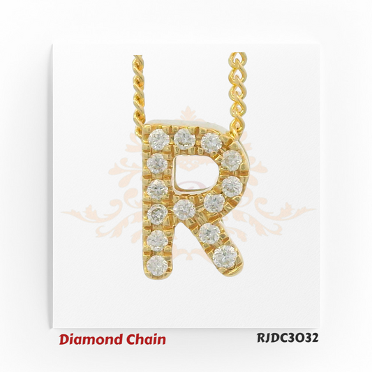 Yellow gold diamond chain with a radiant "R" pendant, fully adorned with sparkling round-cut diamonds. Attached to a twisted gold rope chain, displayed on a white backdrop with a crown and floral watermark. Model number RJDC3032.