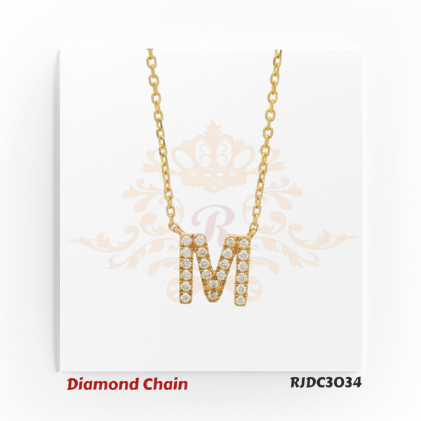 Elegant yellow gold necklace showcasing an “M”-shaped pendant, lavishly encrusted with dazzling round-cut diamonds. Paired with a classic gold link chain, model RJDC3034 exudes sophistication and timeless appeal.
