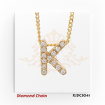 Dazzling yellow gold diamond chain featuring a pendant in the shape of the letter "K", fully encrusted with sparkling round-cut diamonds. The pendant hangs from a twisted rope-style gold chain, displayed on a clean white background with an elegant crown and floral watermark. Model number RJDC3041 is shown at the bottom.