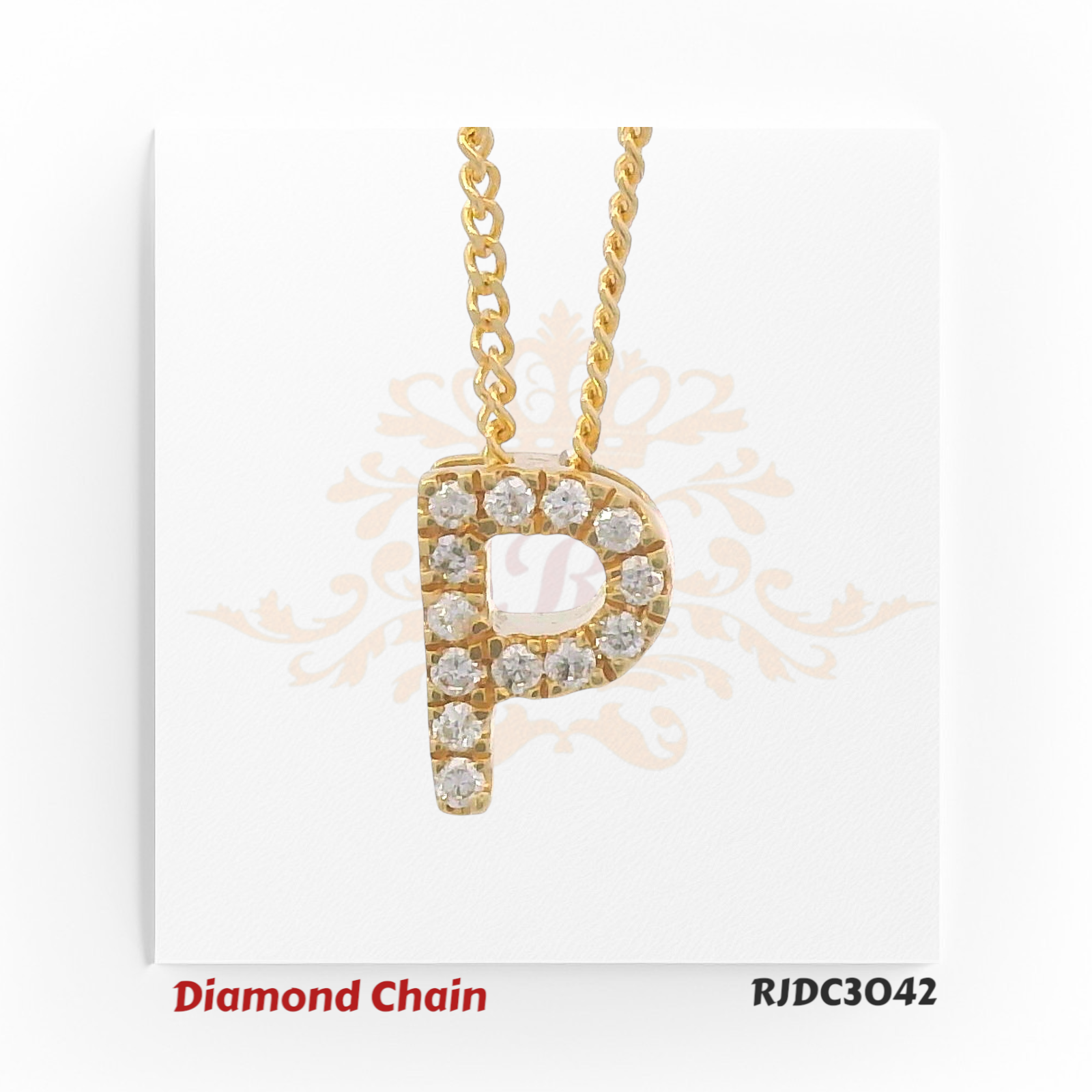 Charming yellow gold chain with a diamond-studded "P" pendant, showcasing brilliance with round-cut diamonds. Suspended from a classic twisted chain and presented on a light floral and crown backdrop. Model number RJDC3042.