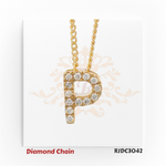 Charming yellow gold chain with a diamond-studded "P" pendant, showcasing brilliance with round-cut diamonds. Suspended from a classic twisted chain and presented on a light floral and crown backdrop. Model number RJDC3042.