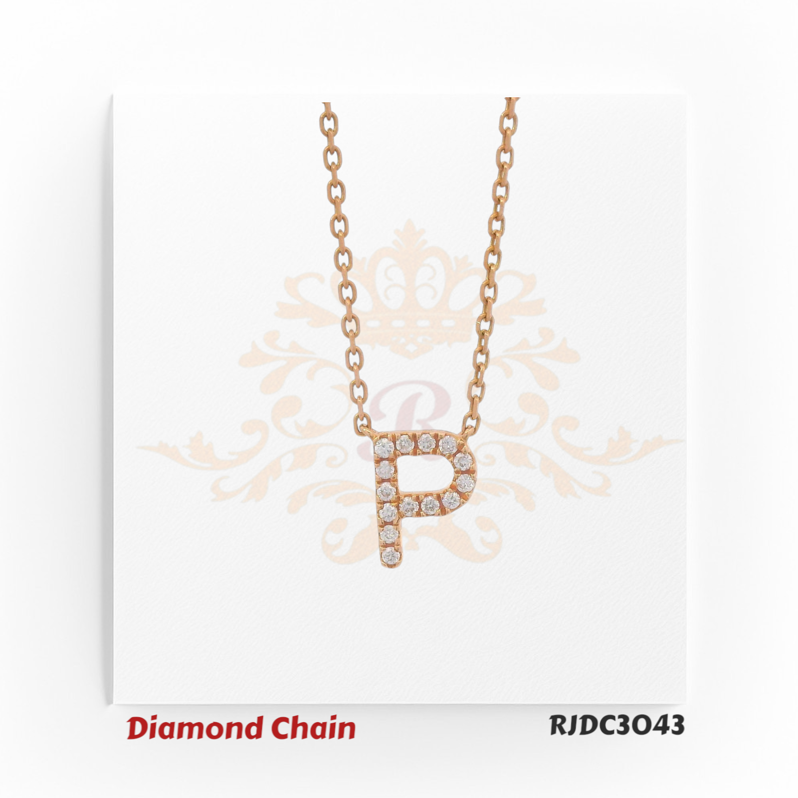 Refined rose gold diamond chain showcasing a pendant in the shape of the letter "P", embellished with sparkling round-cut diamonds. The pendant is suspended from a delicate rose gold link chain and set against a white background with a graceful crown and floral motif. Model number RJDC3043.