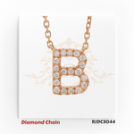 Rose gold diamond chain featuring a bold pendant in the shape of the letter "B", encrusted with brilliant round-cut diamonds. Suspended from a rose gold link chain and set against a white background with a regal crown and floral motif. Model number RJDC3044.