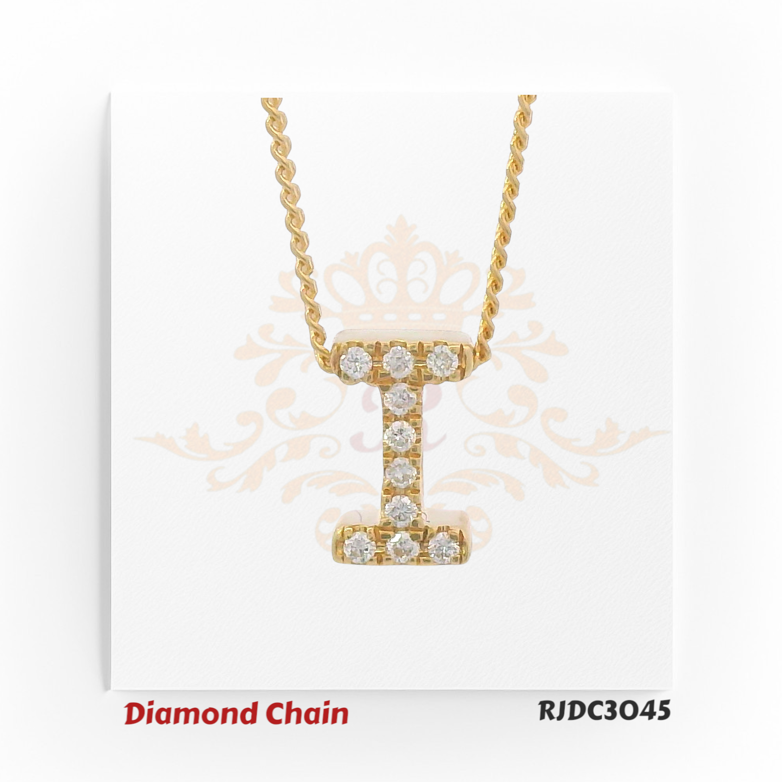 Classic yellow gold diamond chain with a pendant shaped like the letter "I", encrusted with shimmering round-cut diamonds. The pendant is attached to a twisted rope-style gold chain, presented on a white background with a regal crown and floral design. Model number RJDC3045.