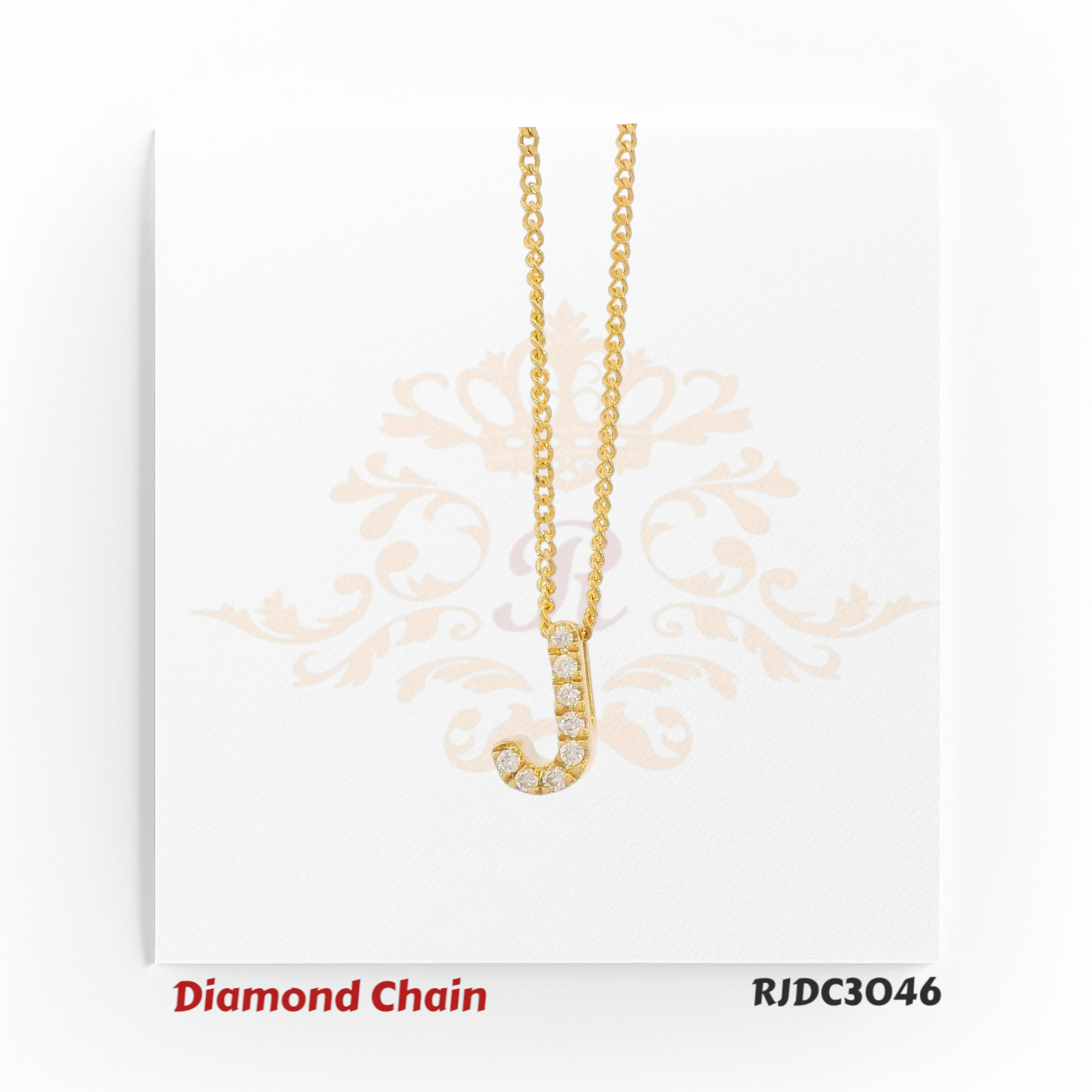 Radiant yellow gold diamond chain with a letter “J” pendant, elegantly set with round-cut diamonds and paired with a twisted gold rope chain. Model RJDC3046.