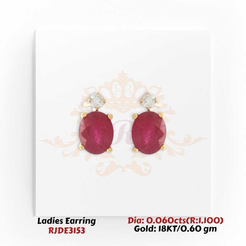 18KT gold ruby and diamond stud earrings with oval ruby center and round diamond accent totaling 1.160 carats