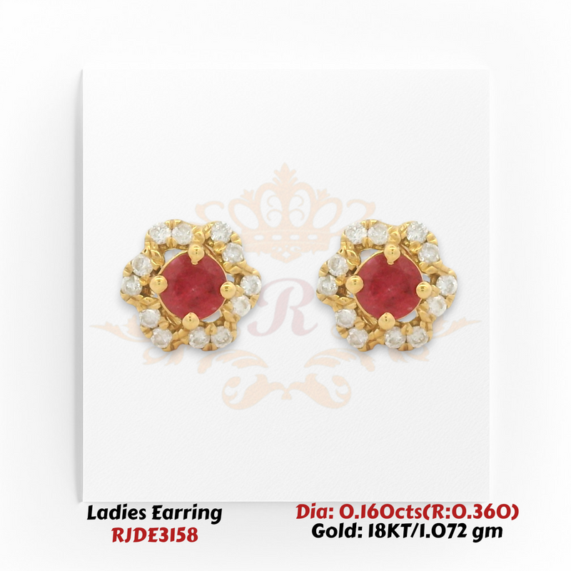 18KT gold ruby and diamond stud earrings with round ruby center and diamond halo in a floral design