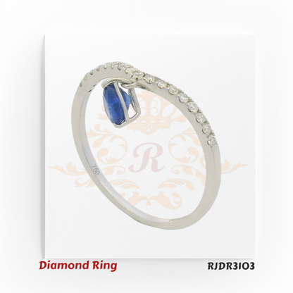Stylish 18kt white gold V-band ring featuring a pear-shaped sapphire drop, accented with sparkling round diamonds – RJDR3103.