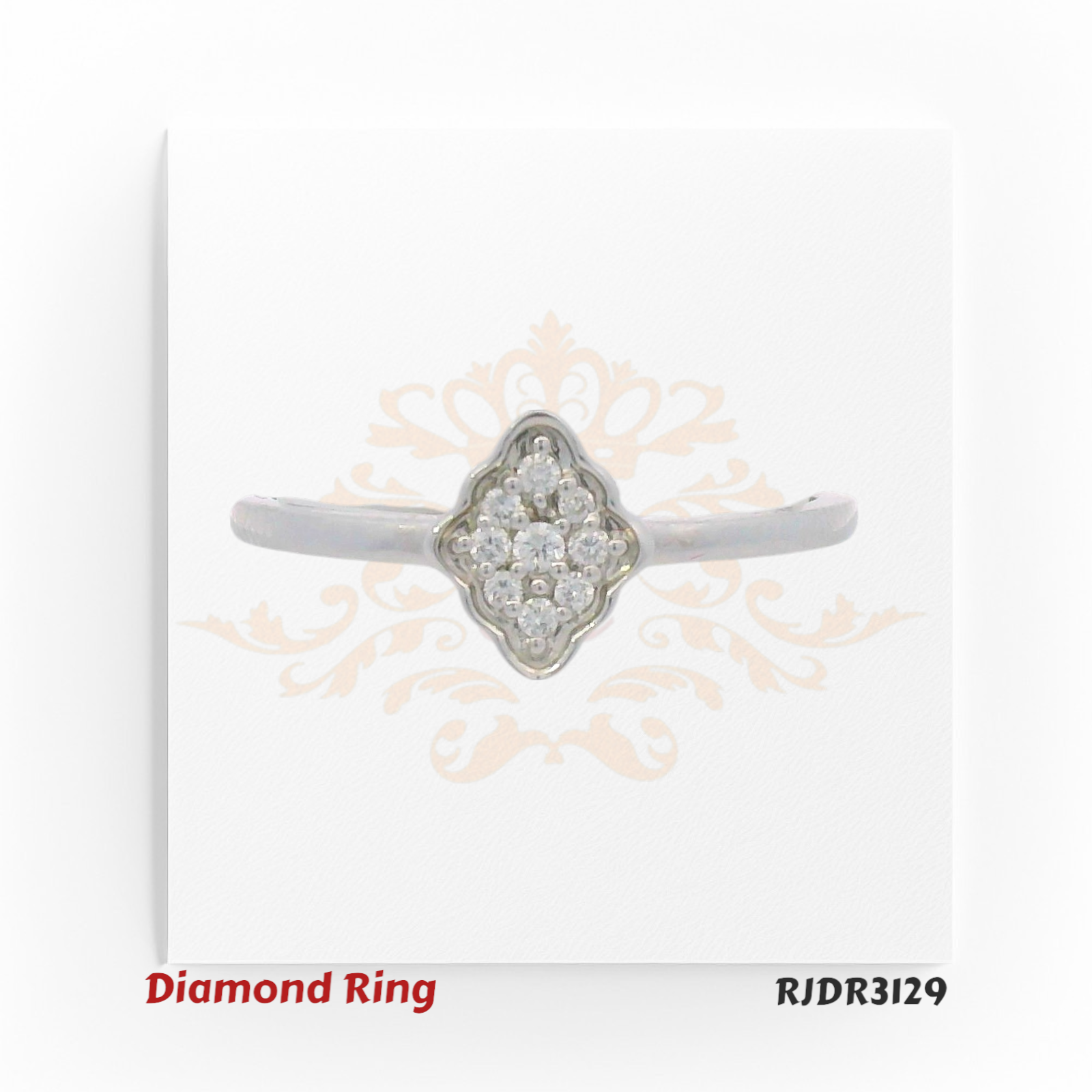 Sophisticated 18kt white gold design with sparkling round diamonds arranged in a floral cluster, beautifully framed in a quatrefoil setting – RJDR3129.