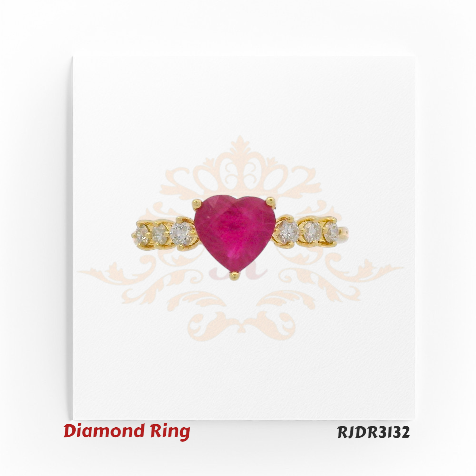 Charming 18kt yellow gold design with a vivid heart-shaped ruby centerpiece, flanked by shimmering diamond accents – RJDR3132.