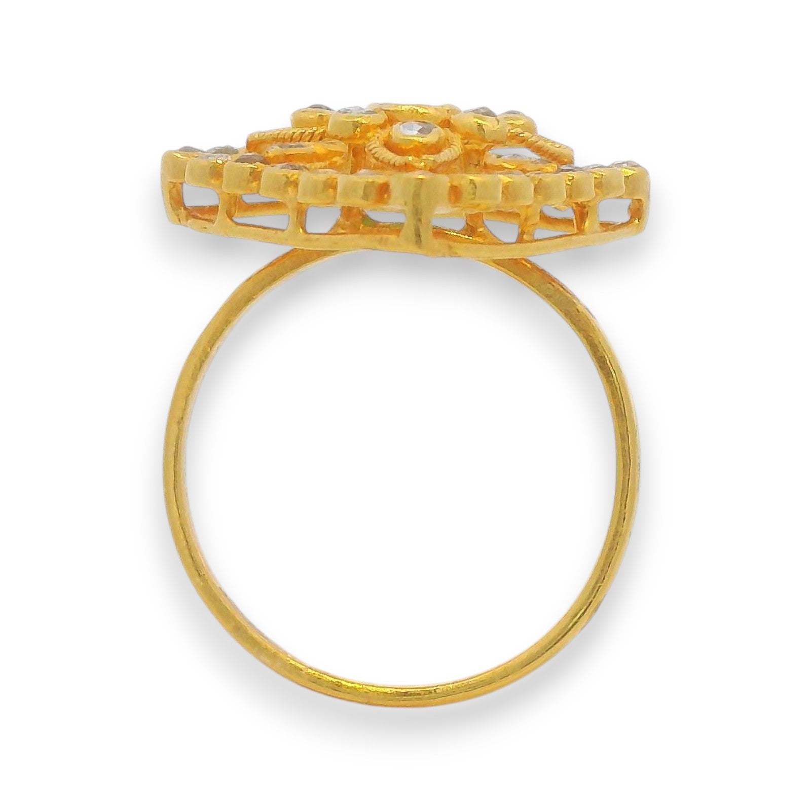 Elegant 22kt gold ladies diamond ring featuring a raised emerald centerpiece with intricate detailing – Regal Jewels model RJDR3230.