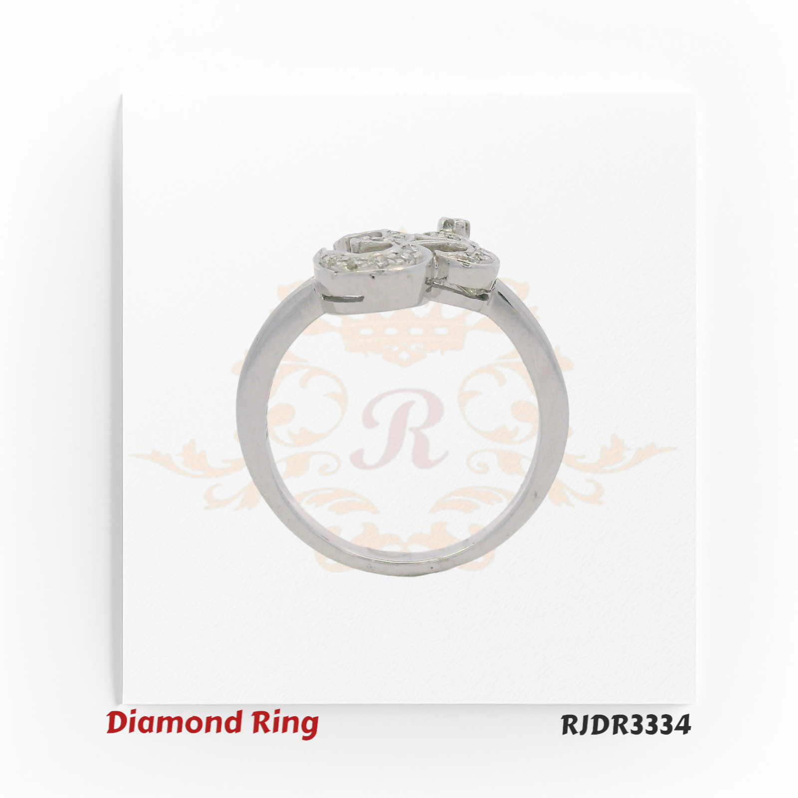 Elegant 18kt white gold ring showcasing a beautifully crafted Om symbol, fully adorned with sparkling diamonds – RJDR3334.