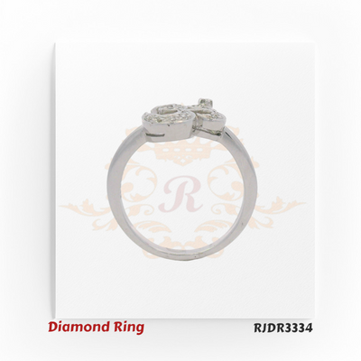 Elegant 18kt white gold ring showcasing a beautifully crafted Om symbol, fully adorned with sparkling diamonds – RJDR3334.