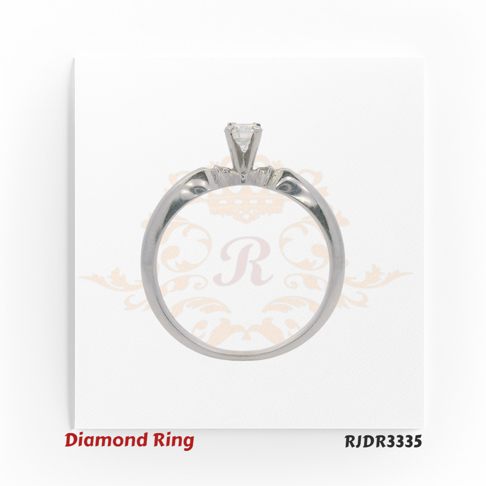 Elegant 18kt white gold solitaire ring showcasing a 0.19 ct VS-clarity diamond at the center. Size 6 – RJDR3335.