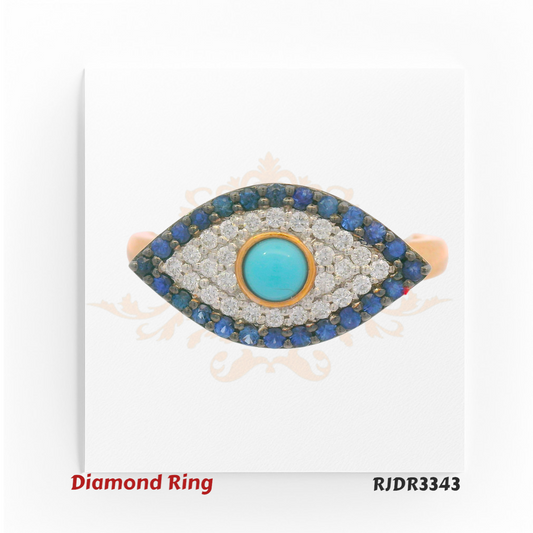 Striking 18kt gold ring in an Evil Eye design, showcasing a turquoise centerpiece framed by glittering diamonds and deep blue sapphires – RJDR3343.