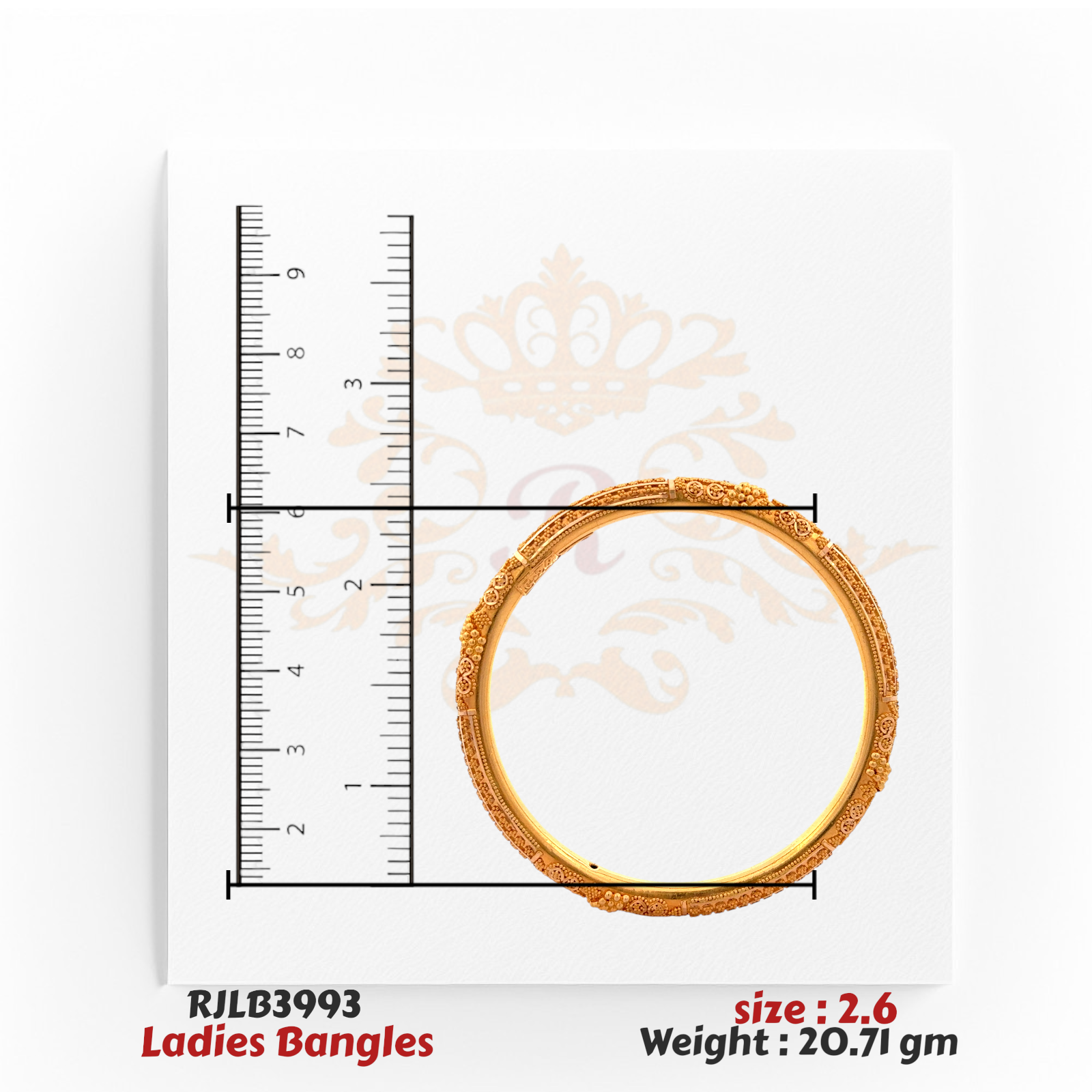 Top view of an ornate gold ladies bangle adorned with intricate floral and beaded detailing along the band, displayed with a ruler for size accuracy. Model RJLB3993.
