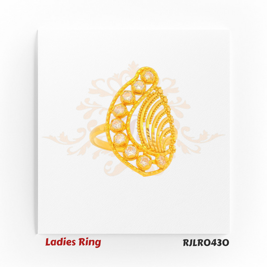 Elegant ladies gold ring, model RJLR0430, featuring a teardrop-shaped design with intricate openwork and a row of sparkling round embellishments along the outer curve, set against a white background with a faint floral pattern.
