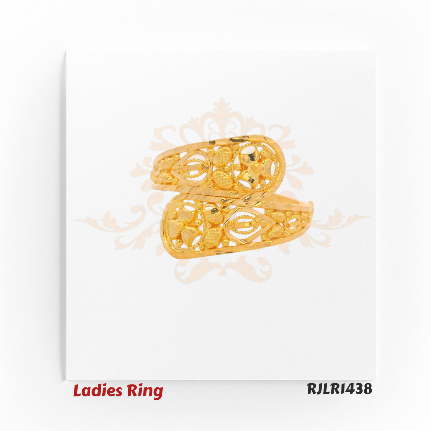Angled view of an elegant 22kt gold ladies ring showcasing sweeping twin bands with intricate openwork filigree and floral accents. Model RJLR1438.