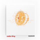 RJLR1439 – Side angle of gold ladies ring RJLR1439 showcasing raised floral motif and pink gemstone center.