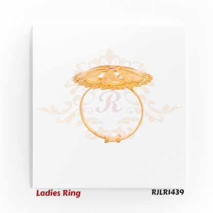 RJLR1439 – Profile view of gold ladies ring RJLR1439 highlighting thin band and large floral top with pink gemstone.