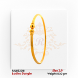 Minimalist gold ladies bangle featuring a sleek round band accented with two polished spherical beads at the center, offering a refined and timeless style. Model RJLB3206.