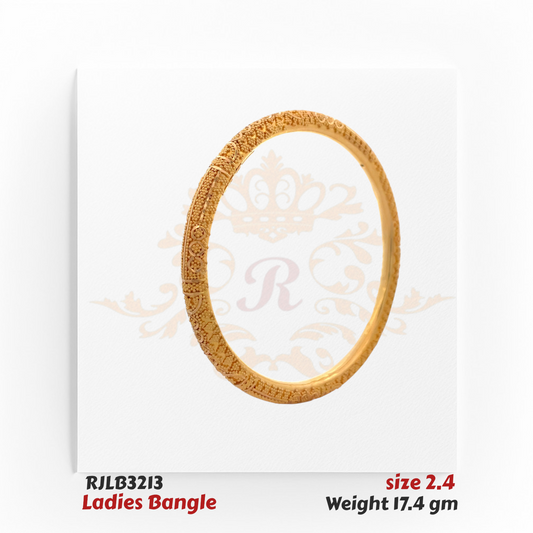Angled view of a finely detailed gold ladies bangle adorned with intricate floral, scroll, and lattice engravings, complemented by delicate beaded textures for a timeless traditional look. Model RJLB3213.