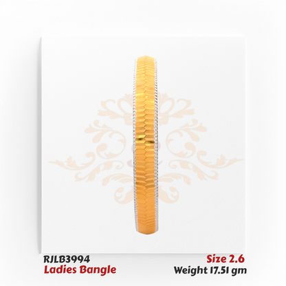 Front view of a gold ladies bangle with a central row of finely faceted gold segments bordered by white-edged detailing, offering a sleek and contemporary design. Model RJLB3994.