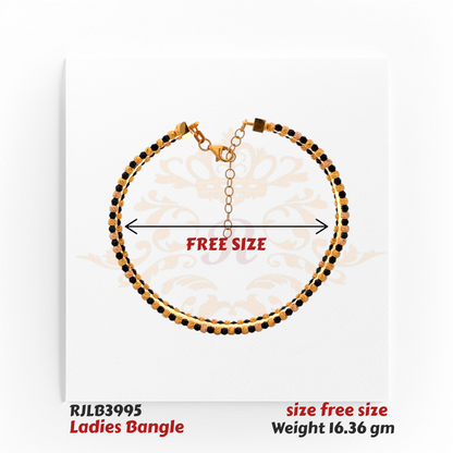 Top view of an adjustable gold ladies bangle adorned with alternating black and gold bead accents, featuring a linked chain clasp for a customizable fit. Model RJLB3995.