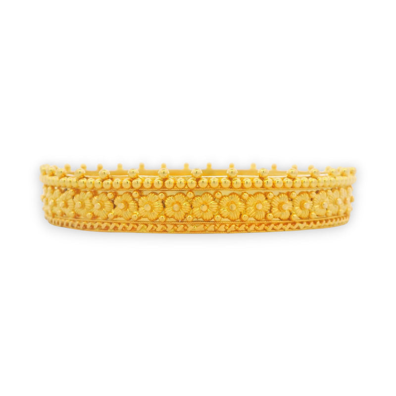 Side profile of 22kt gold bangles with intricate floral motifs and textured dome pattern, Regal Jewels Chicago – RJLB3012.