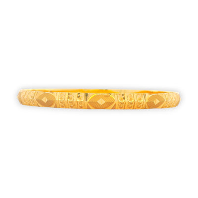 Luxurious side profile of 22kt gold bangle showcasing intricate diamond-cut artistry and refined detailing – RJLB3128.