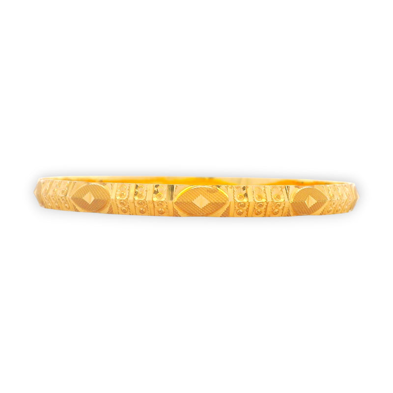 Luxurious side profile of 22kt gold bangle showcasing intricate diamond-cut artistry and refined detailing – RJLB3128.