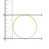 Premium 22kt gold ladies bangle, measured at 2.9 inch diameter on ruler scale, elegant diamond-cut textured design – RJLB3128.