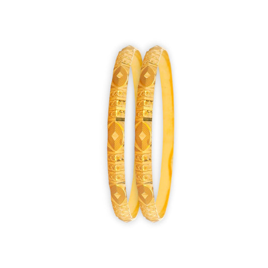 Stunning pair of 22kt gold ladies bangles, featuring bold diamond-cut and textured craftsmanship, timeless ethnic elegance – RJLB3128.