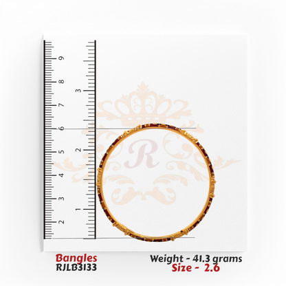 Single RJLB3133 bangle positioned against a ruler backdrop, verifying a 2.6-inch inner diameter