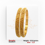 22kt Gold Bangles RJLB3271 – A 32.8-gram, size 2.3 traditional bangle set with intricate filigree and floral detailing. Available at Regal Jewels."