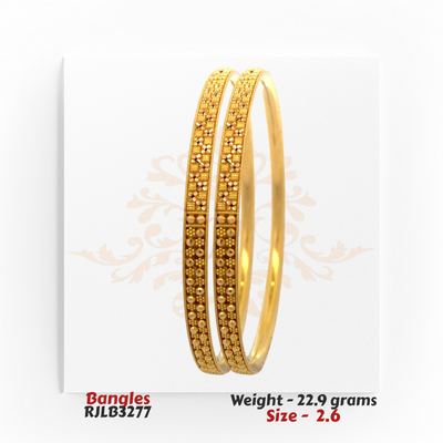 22kt Gold Bangles RJLB3277 – A 22.9-gram, size 2.6 bangle set with intricate floral and bead engravings. Available at Regal Jewels.