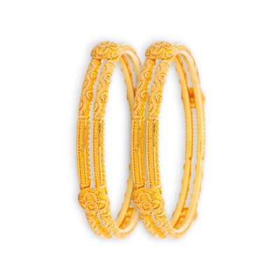 22kt Gold Ladies Bangles RJLB3938 – elegant pair of traditional kada bangles with embossed floral motifs, antique-inspired engraved detailing, angled pair view – Regal Jewels Chicago