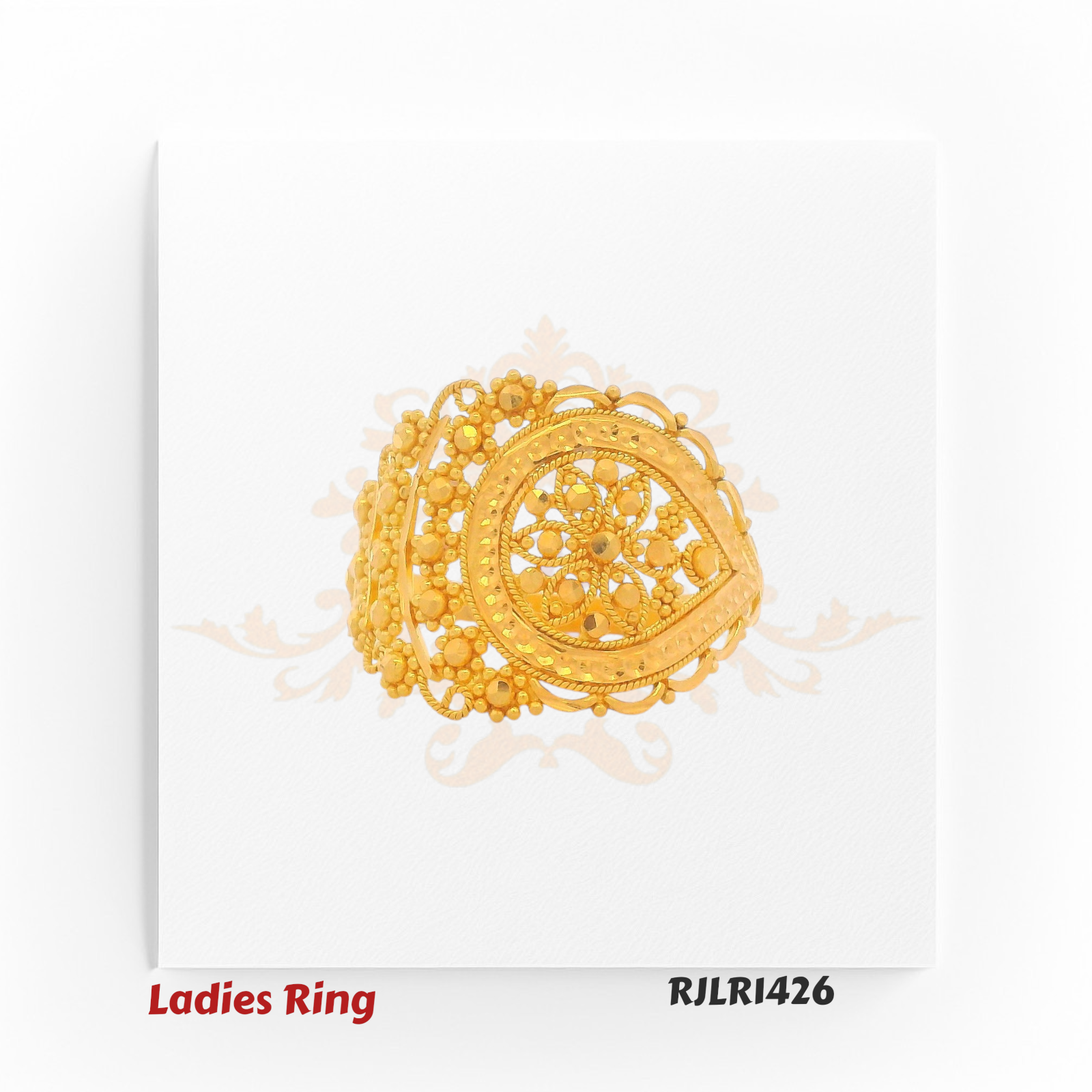 Angled view of an ornate gold ladies ring with a teardrop-shaped centerpiece, showcasing intricate floral filigree work and delicate beaded accents along the border. Model RJLR1426.