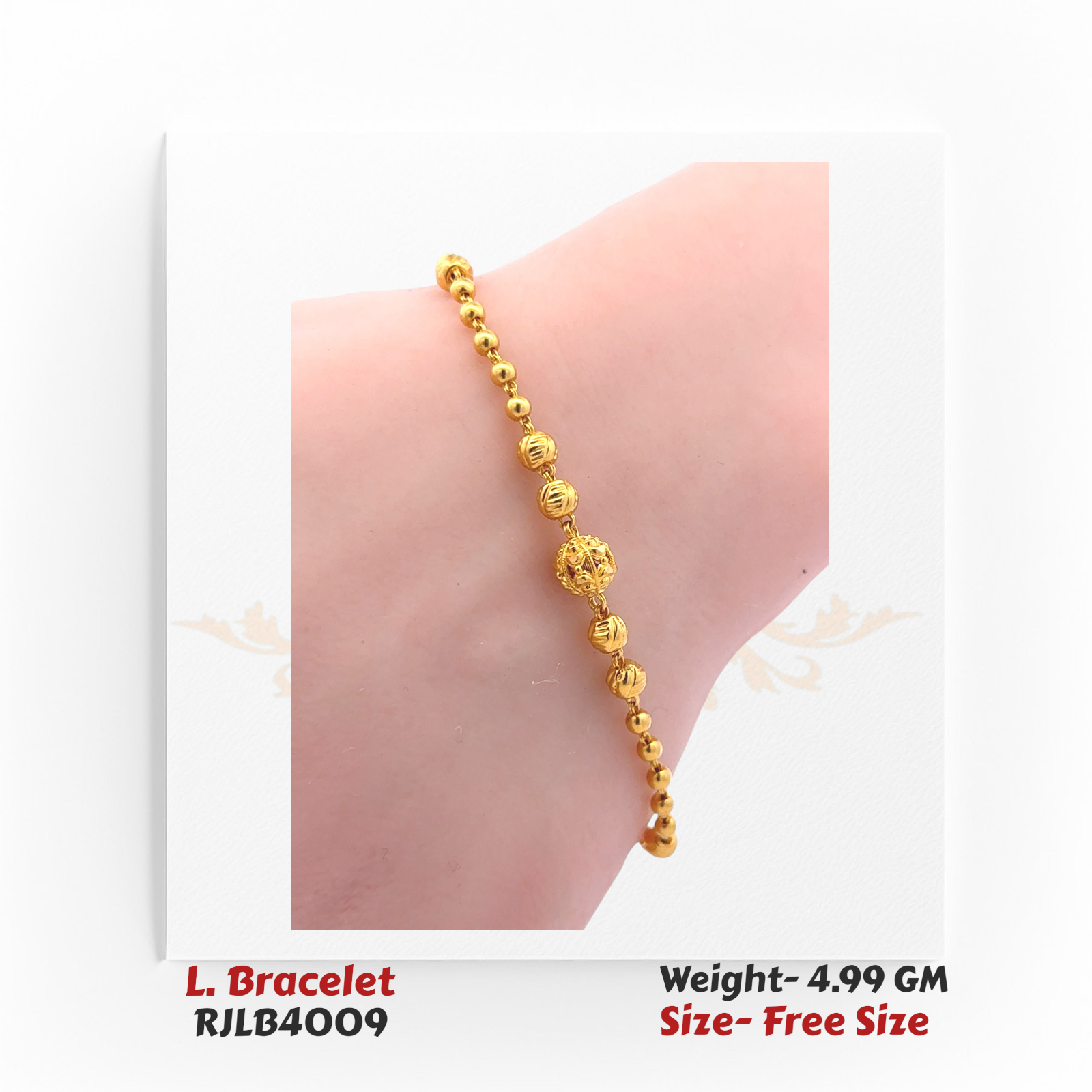 Minimalist ladies’ bracelet composed of smooth and textured yellow gold beads, with a larger ornate bead centerpiece. RJLB4009